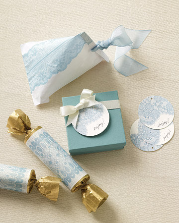 This idea uses pretty lace clip art to decorate tags and favour bags it 